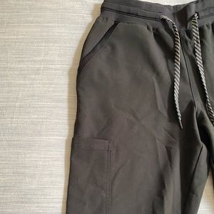 Brand new, never worn Jaannuu women’s black scrub pants